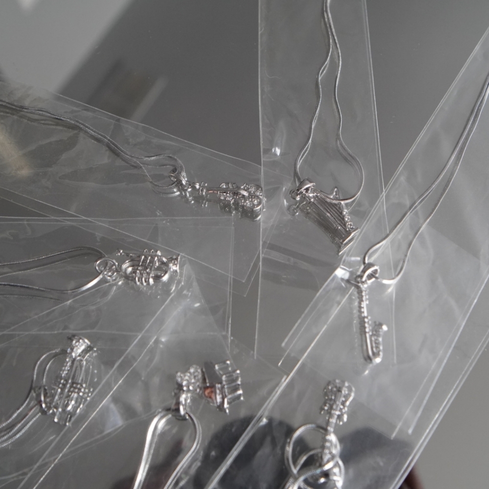 Musical instruments necklace bundle